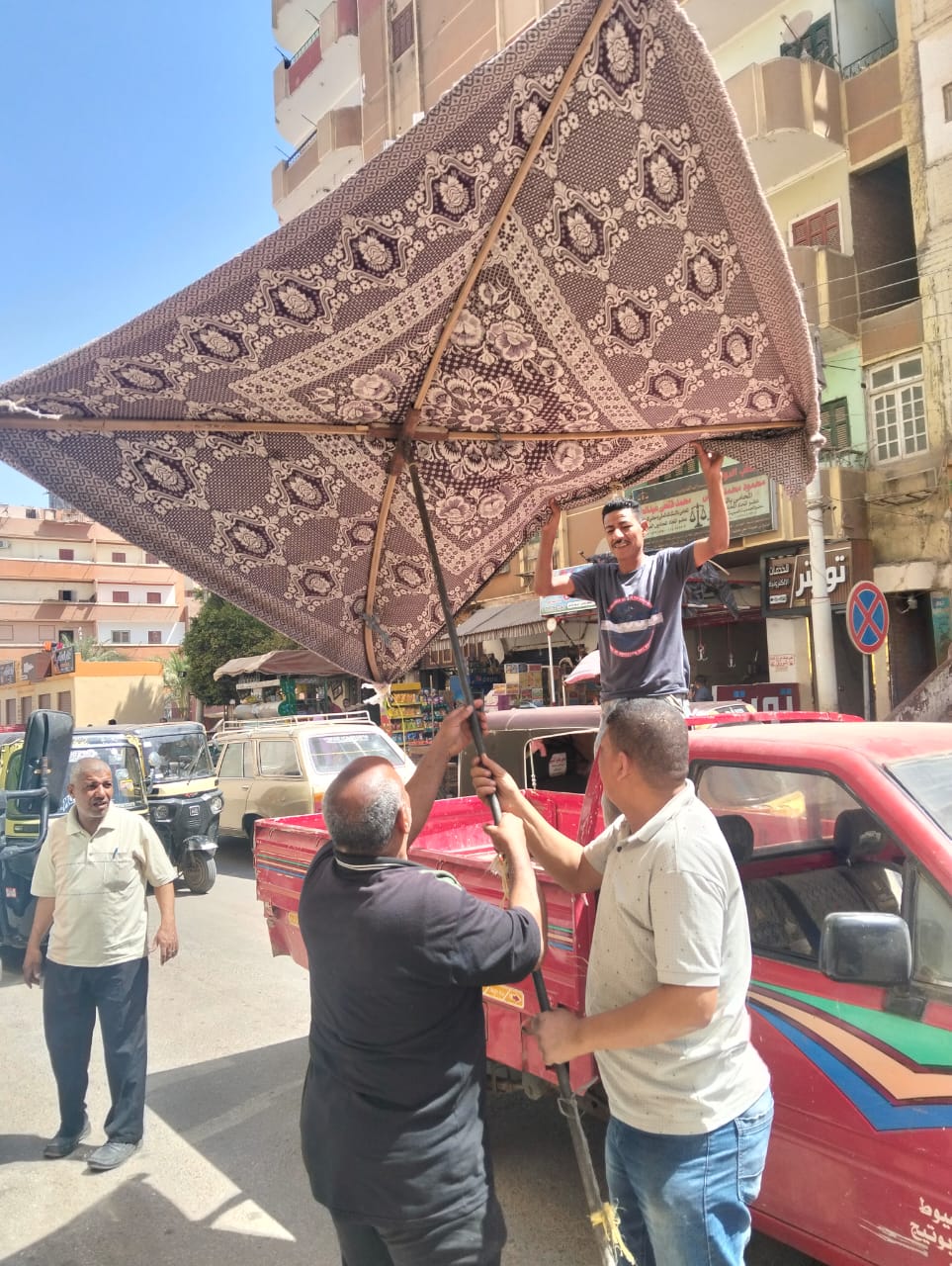 إزالة الإشغالات في أبو تيج بأسيوط