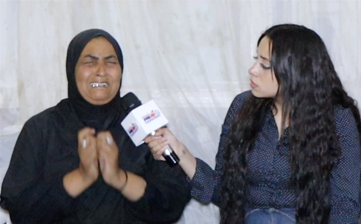 والده امل ضحية زوجها مع مراسلة نيوز رووم&nbsp;