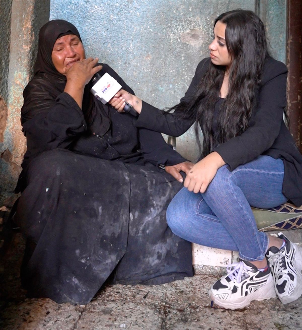 جارة محمد الضحية مع مذيعة نيوز رووم