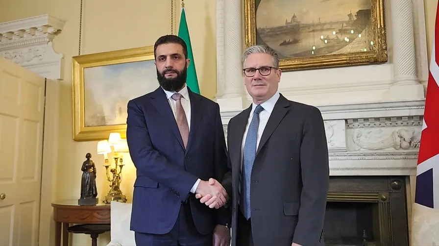<strong>رئيس الوزراء البريطاني والرئيس السوري</strong>