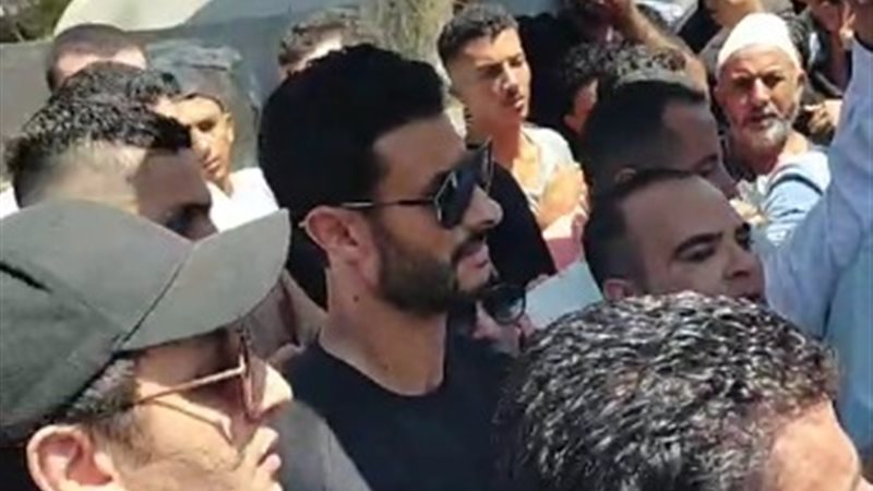 محمد الشناوي في جنازة