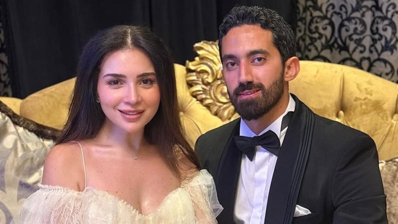 مي عز الدين وزوجها
