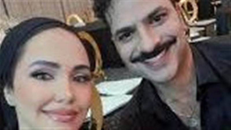 مصطفي أبو سريع وزوجته
