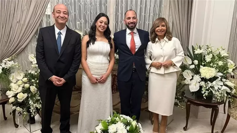  عمرو أديب ولميس