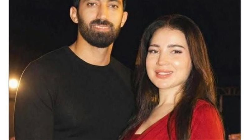 مي عز الدين وزوجها