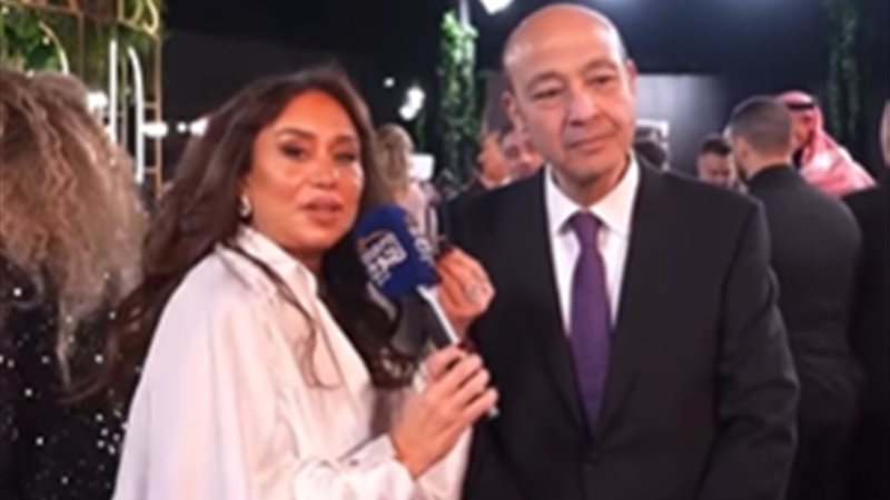 عمرو أديب وإنجي علي