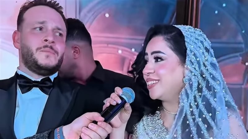 نعوم عصام وزوجها