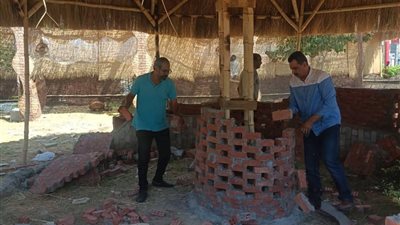إزالة إشغال مخالف في المهد بمحيط محطة بنزين التعاون بحي عتاقة بالسويس 