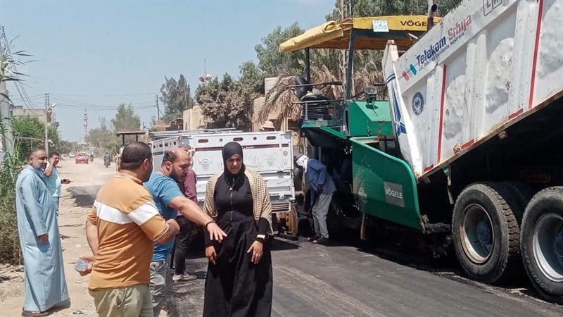 رصف طريق الكوم الطويل