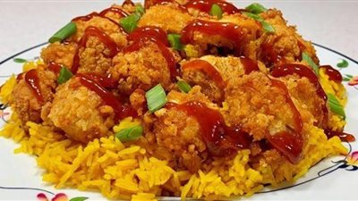 بمكونات بسيطة.. طريقة عمل الريزو بالدجاج المقرمش مثل المطاعم
